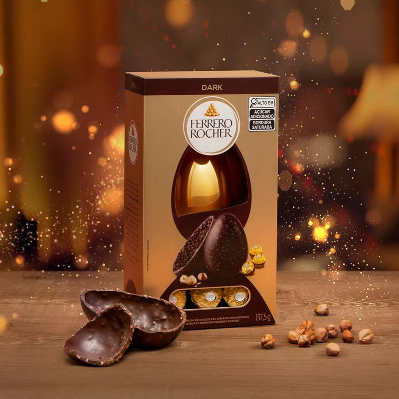 Ovo De Páscoa De Chocolate Dark Amargo Com Pedaços De Avelãs Com 3 Bombons Ferrero Rocher Caixa 137,5g